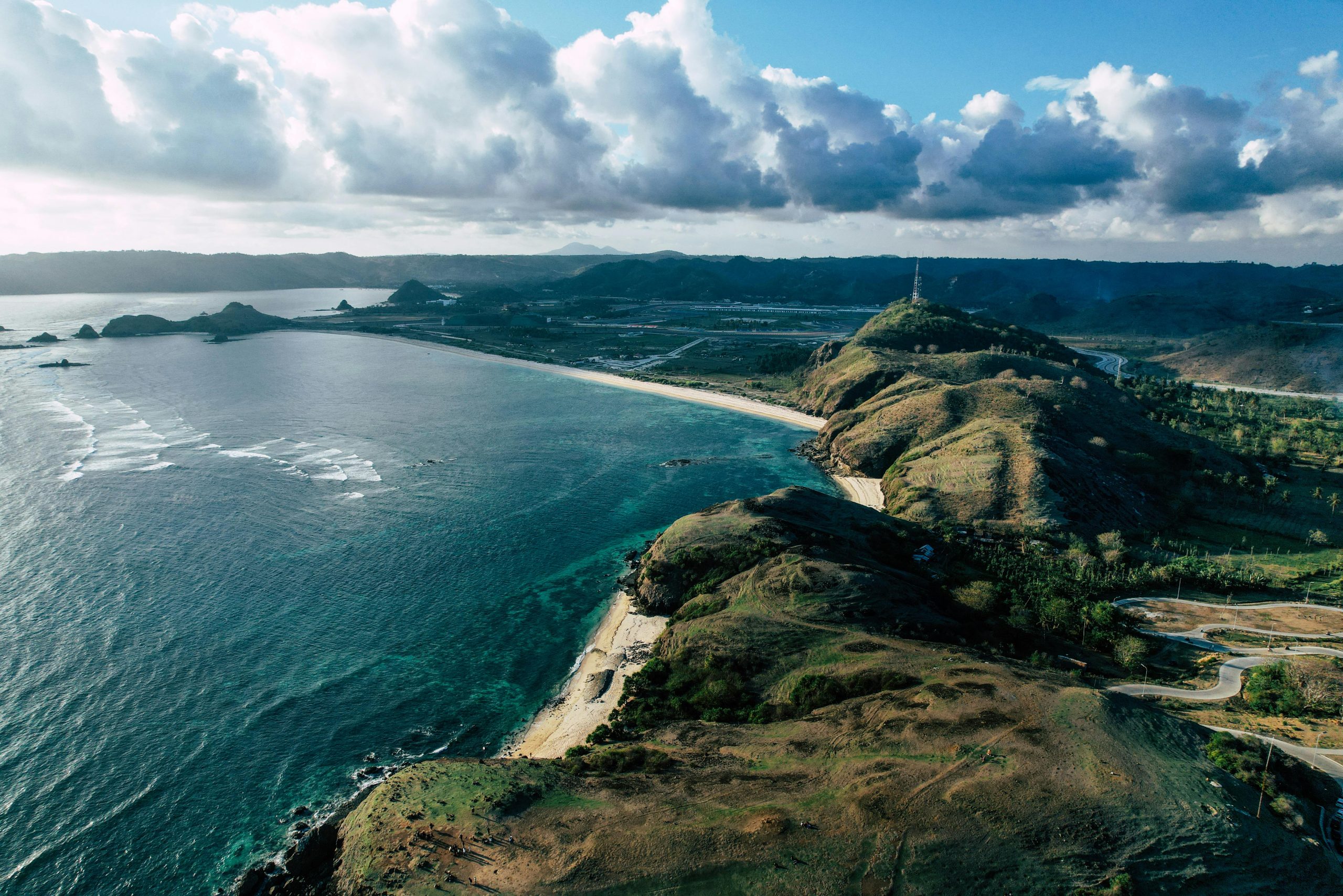 Aerial View of Mandalika Beach with Crystal-Clear Waters and Sandy Shores